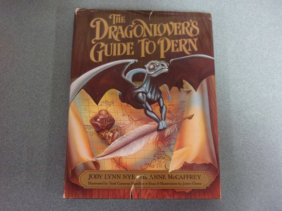 The Dragonlover's Guide to Pern by Jody Lynn Nye and Anne McCaffrey (HC/DJ)***This copy shows significant wear to the dust jacket.***