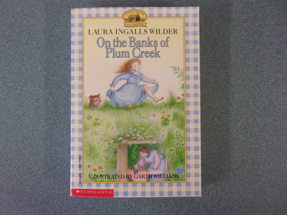 On The Banks Of Plum Creek by Laura Ingalls Wilder (Paperback)
