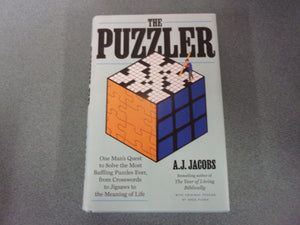 The Puzzler: One Man's Quest to Solve the Most Baffling Puzzles Ever, from Crosswords to Jigsaws to the Meaning of Life by A.J. Jacobs (HC/DJ) 2022!