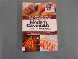 Modern Caveman: The Complete Paleo Lifestyle Handbook by Brett L. Markham  (Ex-Library Softcover)