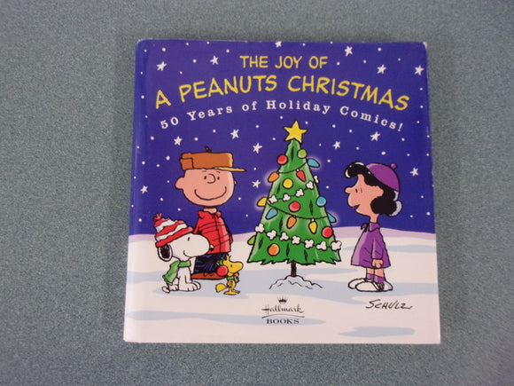 The Joy of A Peanuts Christmas: 50 Years of Holiday Comics (Small Format HC/DJ)